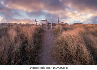 Sandy Beach Pathway To Gate In Anglesea North Wales 