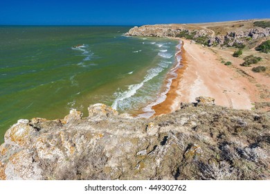 sandy beach with rocks