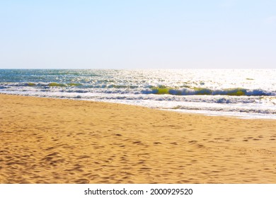 Sandy Beach With Sea Waves . No People On The Seaside