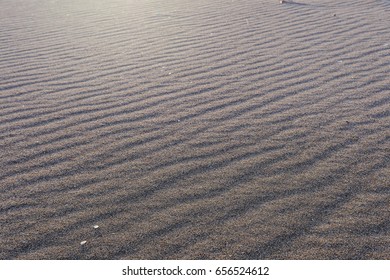 The Sandy Beach In The Sunset