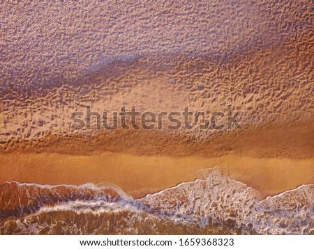 Similar – Foto Bild Luftbild Panoramadrohne Blick auf blaue Meereswellen und schönen Sandstrand in Portugal