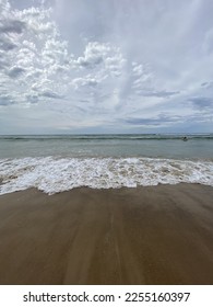 Sandy Beach and the Waves