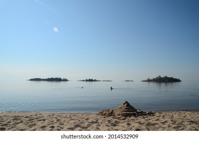 Sandy beaches of Koyonsaari island. the islands of the Ladoga lake in the early morning