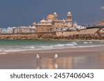 Sandy city beach in Cadiz on a sunny day.