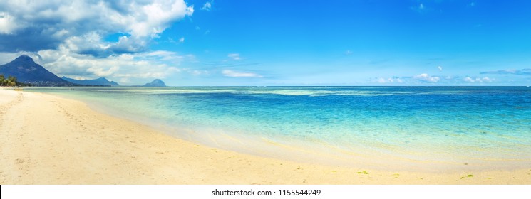 Sandy tropical Wolmar beach at sunny day. Beautiful landscape. Panorama. Mauritius - Shutterstock ID 1155544249