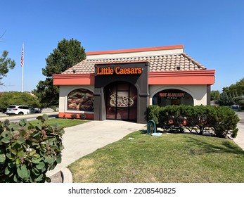 Sandy, Utah, U.S.A. - August 3rd 2022: Exterior View Of A Little Caesars Pizza Parlor Where People Come And Buy Hot N Ready Pizza And Crazy Bread As A Side For Those Picky Young Eaters.