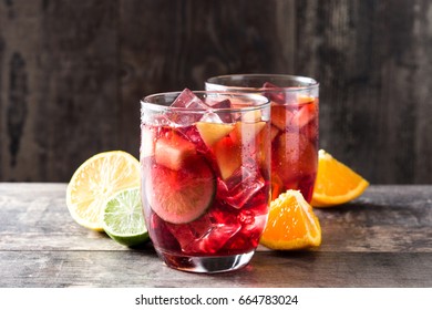 Sangria Drink In Glass On Wooden Table
