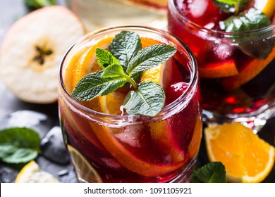 Sangria With Fruit, Ice And Mint In Glass. 