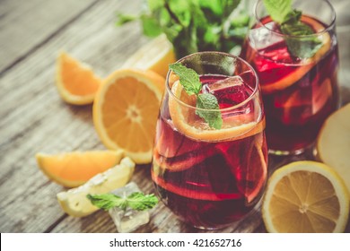 Sangria and ingredients in glasses