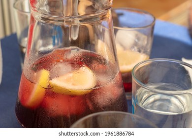 Sangria With Red Wine Lemon And Ice Cubes On Blue Table Alicante Spain