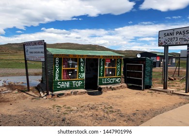 Sani Pass, Lesotho - February 26, 2019: A Small Local Shop Near A Road Sign Stating 