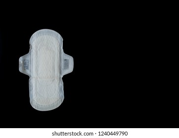 The Sanitary Napkin, Menstrual Pad Or Maxi Pad On The Black Background