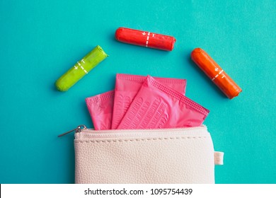 Sanitary Pads And Tampons In Handbag