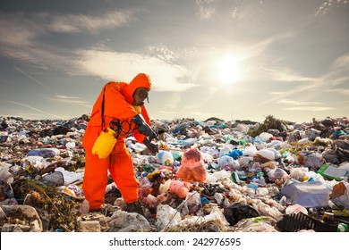 Sanitation Worker Working On The Landfill