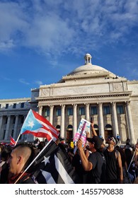 SanJuan, Puerto Rico - July 17, 2019: About 300k Protesters Claim The Resignation Of The Governor Of Puerto Rico Ricardo Roselló In Front Of The Capitol.