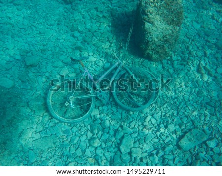 sank bike lie on the rocky seabed