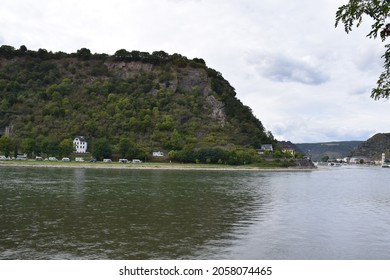 Sankt Goar, Germany - 09 30 2021: Mittelrheintal waterfront opposite the Lorelei