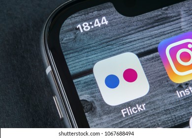 Sankt-Petersburg, Russia, April 12, 2018: Flickr application icon on Apple iPhone X smartphone screen close-up. Flickr app icon. Social media icon. Social network