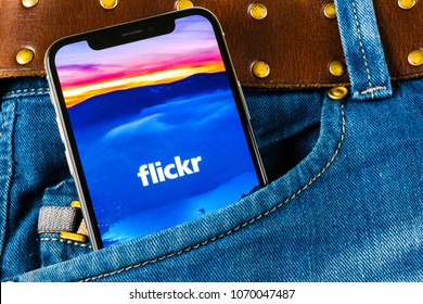 Sankt-Petersburg, Russia, April 14, 2018: Flickr application icon on Apple iPhone X smartphone screen in jeans pocket. Flickr app icon. Social media icon. Social network