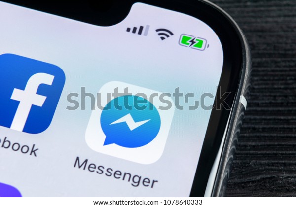 Sankt-Petersburg, Russia, April 27, 2018: Facebook\
messenger application icon on Apple iPhone X screen close-up.\
Facebook messenger app icon. Online internet social media network.\
Social media\
app