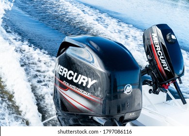 Sankt-Petersburg, Russia, August 8, 2020:  Modern New Fishing Sport Boat With A Brand New Mercury FourStroke Outboard Engine Speeding On The Lake.