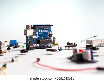 Sankt-Petersburg, Russia - February 28, 2020: Arduino UNO board on light background DIY components. Microcontrollers, boards, sensors, leds, controllers, Microcontroller for programming.
