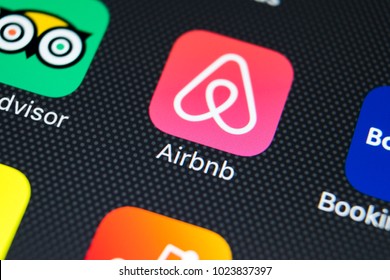 Sankt-Petersburg, Russia, February 9, 2018: Airbnb application icon on Apple iPhone X screen close-up. Airbnb app icon. Airbnb.com is online website for booking rooms. social media network.