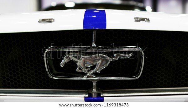 Sankt-Petersburg, Russia, July 21, 2017: Front view of\
Classic retro Ford Mustang GT. Ford Mustang logo with running\
horse. Car exterior details.\
