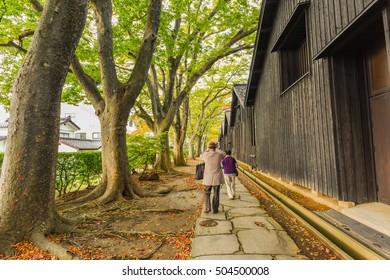 Sankyo Warehouse and Zelkova trees in Autumn Leaves at Sakata, Yamagata, Japan