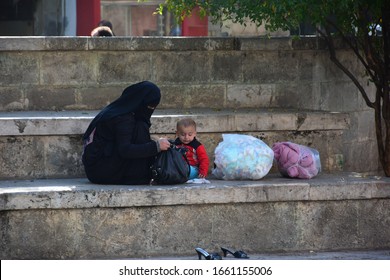 Sanliurfa, Turkey - 2016: Eyyubiye Region.  Divanyolu Neighborhood.  Syrian Refugees.  Syrian Women In The 2nd Year Of The Civil War.