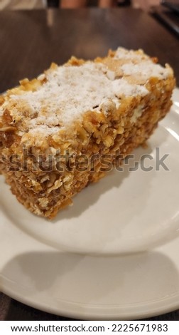 Sans Rival Cake on white plate and close up
