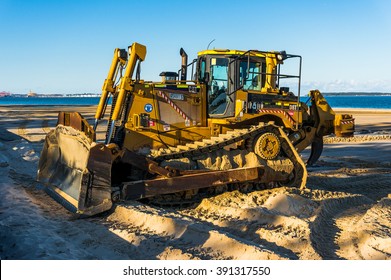  Sans Souci, NSW, Australia - 18 Jun, 2014: Caterpillar Dozer multi terrain loader on the Sans Souci beach