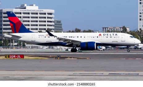 Santa Ana, CA- April 9 2022: A Delta Airlines Airbus A220-300 landing into John Wayne Airport. 