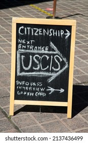 Santa Ana, California - USA - March 13-2022: Citizenship Information Chalk Board On A Sidewalk In Santa Ana California. USCIS Info Pass Interview. Green Card. 