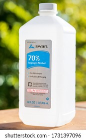 SANTA BARBARA, CA, USA - MAY 9,2020:  Isopropyl Alcohol 70% Swan Brand, First Aid Antiseptic For Rubbing And Massaging Bottle Of 32oz.