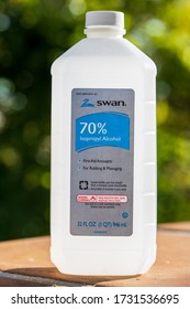 SANTA BARBARA, CA, USA - MAY 9,2020:  Isopropyl Alcohol 70% Swan Brand, First Aid Antiseptic For Rubbing And Massaging Bottle Of 32oz.