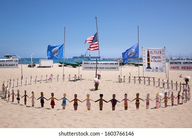 Santa Barbara, California / USA - June 1 2014:  Nuclear Proliferation And Military Spending Protest At West Beach, With The USS Reagan Aircraft Carrier Is The Distance