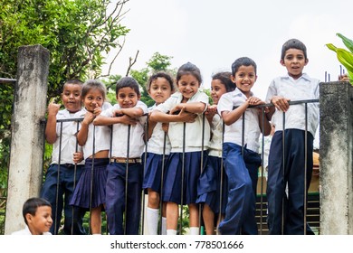 SANTA BARBARA DEPARTMENT, HONDURAS - APRIL 19, 2016: Children in school uniforms in a small village in Santa Barbara department of Honduras.
