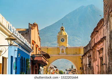 The Santa Catalina Arch and Agua Voclano in Antigua Guatemala, Guatemala