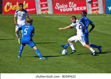 SANTA CLARA, CA - JUNE 25: Players Brad Ring (5), Michael Stephens (26) And Simon Dawkins (10) Compete During The MLS Game Earthquakes Vs LA Galaxy, On June 25, 2011 In Santa Clara, CA.