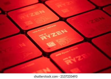 SANTA CLARA, Calif., Mar. 18, 2022: AMD Ryzen 7 5800X3D desktop CPU with 3D V-Cache technology. World's fastest gaming processor according to AMD. Brand red lighting.