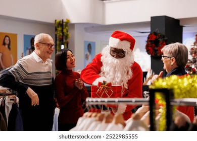 Santa Claus announces names of prize winners while eager group of clients awaits in clothing store to close shopping mall holiday raffle. Excited people listening to employee carrying box. - Powered by Shutterstock