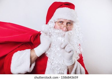 Real Santa Claus Carrying Big Bag Stock Photo (Edit Now) 717542800