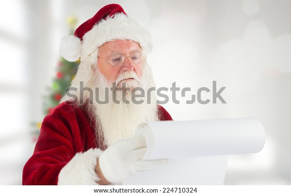 Santa Claus Checking His List Against Stock Photo Edit Now 224710324