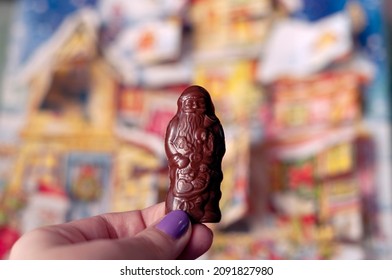 Santa Claus Christmas Advent Calendar Chocolate In A Hand, December