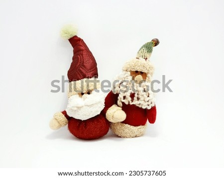 Santa Claus dolls. Christmas ornament. Decor. Statue. Festive ornament. Isolated white. Xmas.	