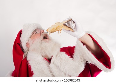 Santa Claus Eating A Cake