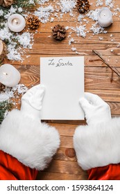 Santa Claus With Empty Letter On Wooden Background