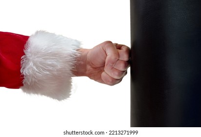 Santa Claus Fist Punching Bag. Sport And Christmas Concept . High Quality Photo