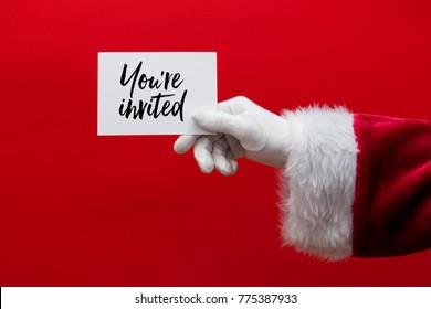 Santa Claus Hand Holding A Christmas Sign